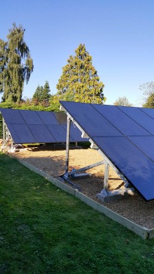 Solar farm with multiple rows of solar panels near Cambridge