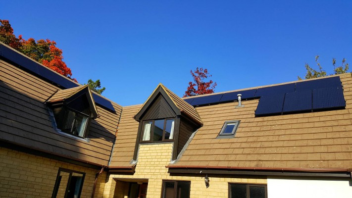 Multiple solar panel installations over a housing estate in Cambridge