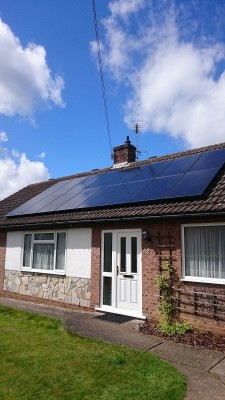 Two rows of solar panels provide good amount of electricity for a family living in a bungalow near Cambridge