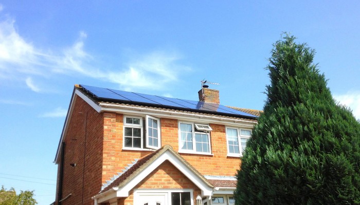 Beautiful detached house with solar panels generating electricity for a Cambridge-based family